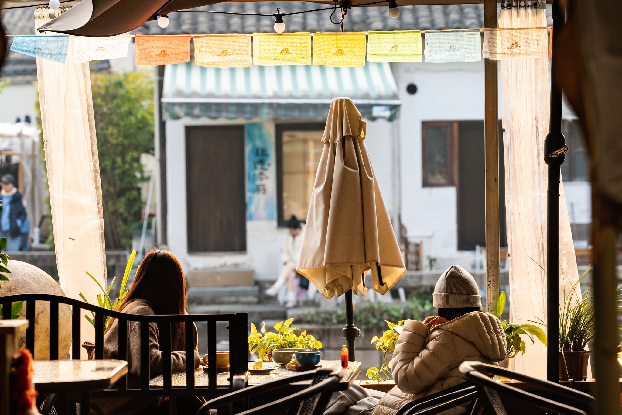 Traditional Hangzhou dishes including noodles and West Lake fish at a local restaurant